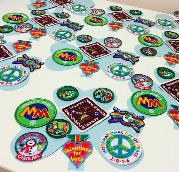 Patches on a sky blue trefoil