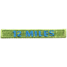 A green patch with the words 12 Miles in blue thread on it.