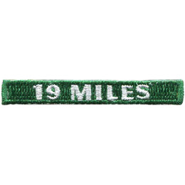 The words 19 Miles are in white on a green background.