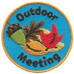 acorn and leaves on blue with orange border, the words Outdoor Meeting surround the image