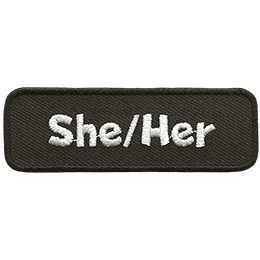 The pronouns She Her on a black background.