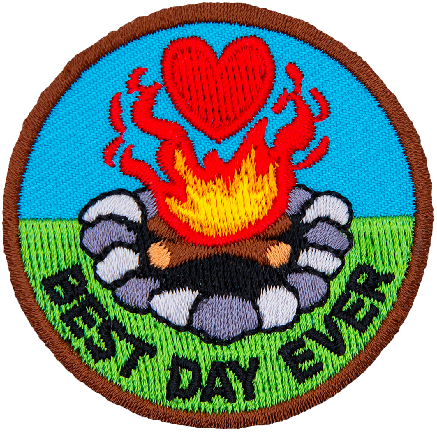 The words best day ever are underneath a campfire. A heart is seen in the flames.