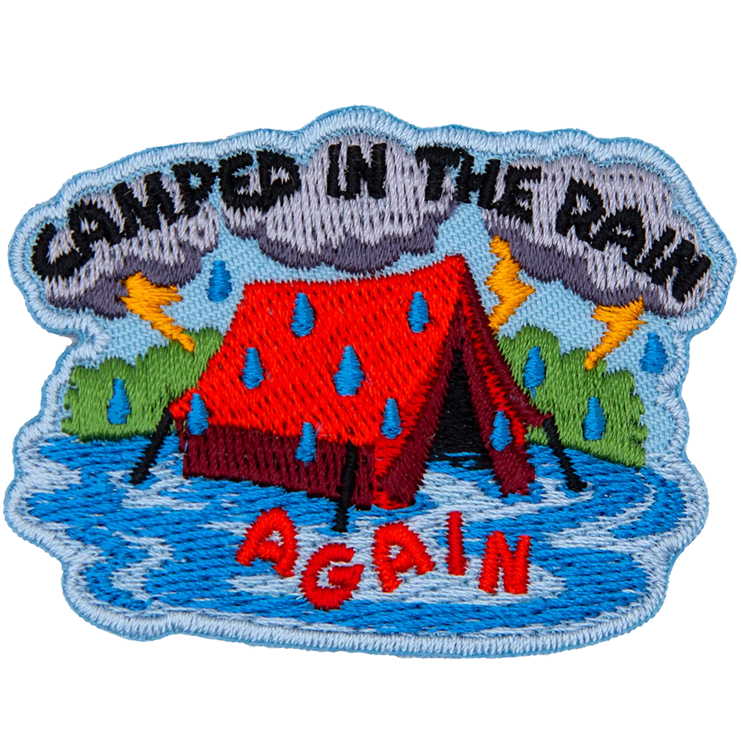 The words I camped in the rain again around a red tent that is flooded.