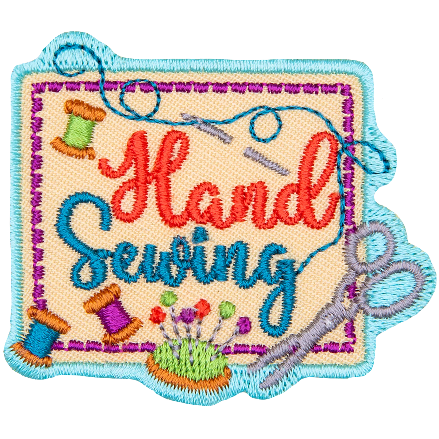 The words Hand Sewing on a sewn patch.