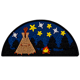 A tipi under the night sky.