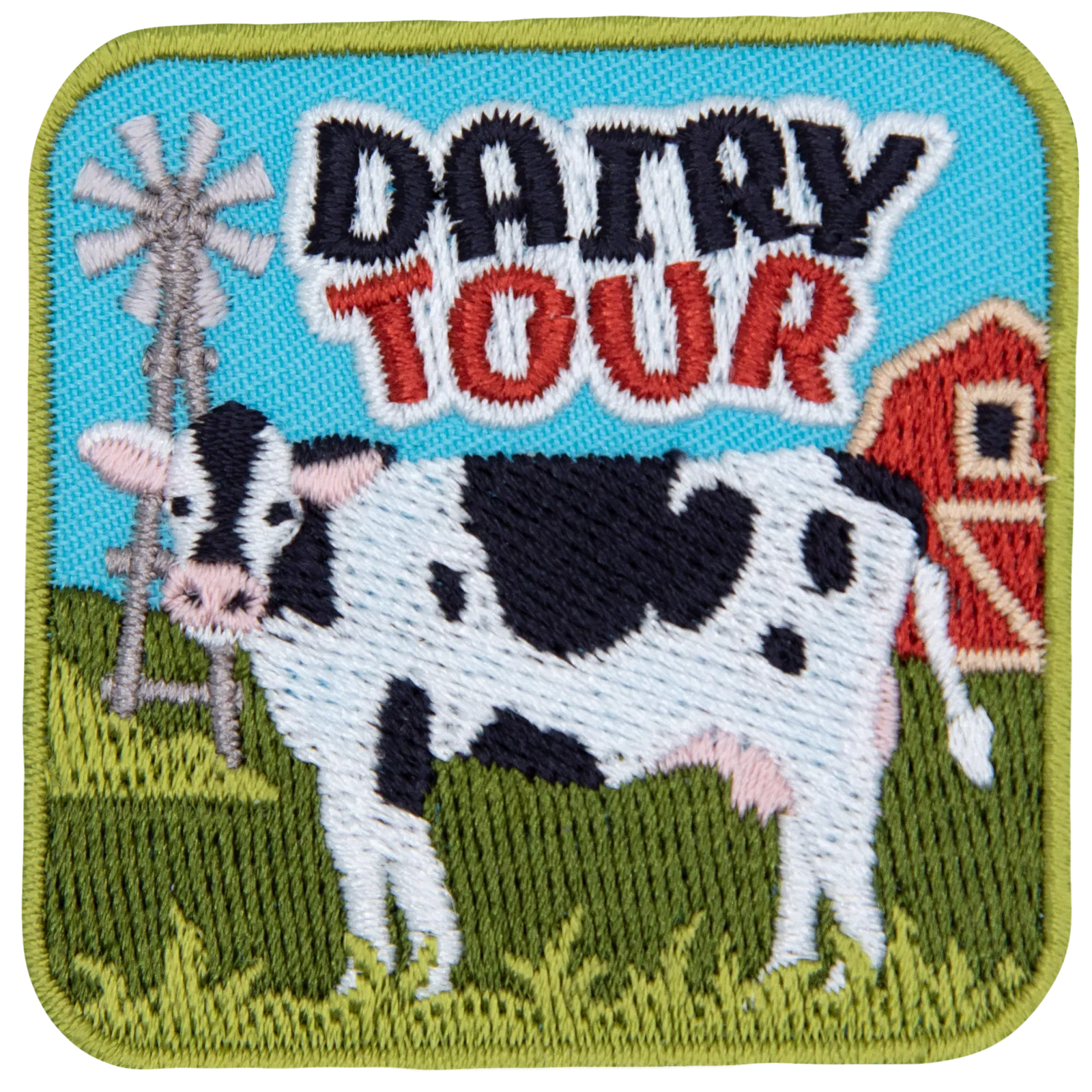 The words Dairy Tour above a black and white cow on a farm.