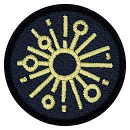 A light symbol on a black background. 