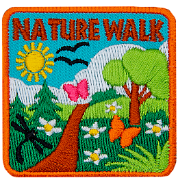 The words Nature Walk above a gorgeous nature scene of butterflies and rolling green hills. 