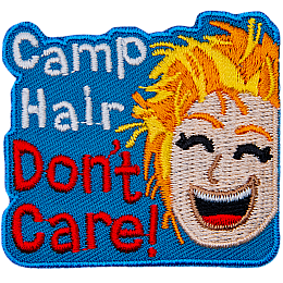 The words camp hair don't care with a lady who has messy hair.