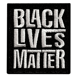 The words Black Lives Matter in white text on a black patch.