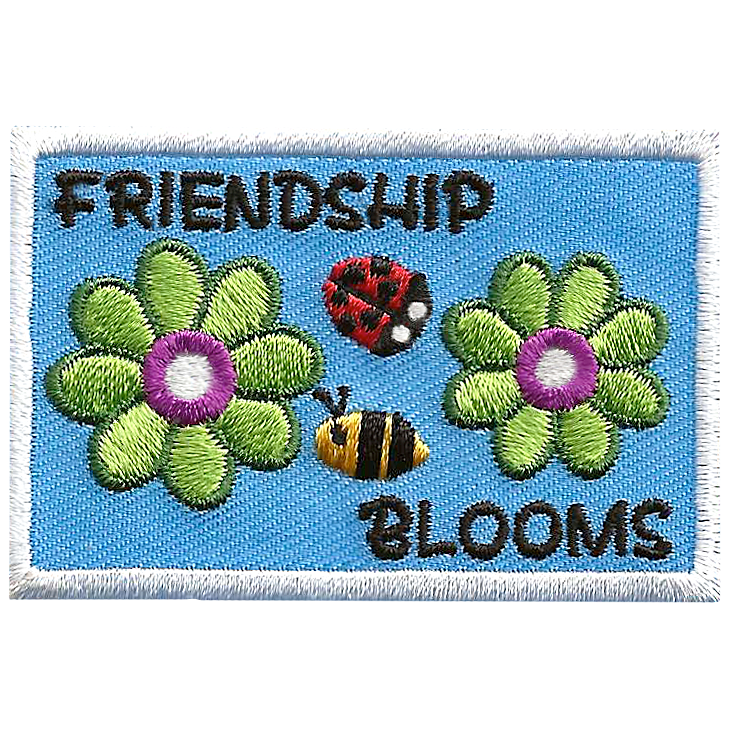 The words Friendship Blooms are surrounding a bee and ladybug, and two green flowers.