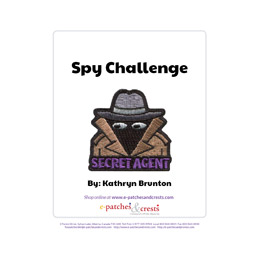The words Spy Challenge are above a secret agent patch.