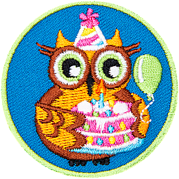 An owl holding a birthday cake. 