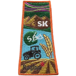 This patch is in the shape of the Canadian province of Saskatchewan with symbols such as the northern lights, grasslands, mountains, prairies, a tract