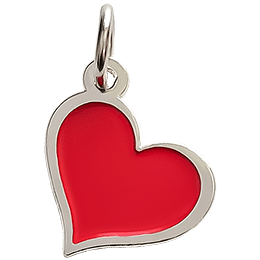 A beautiful red heart has been turned into a decorative metal charm.