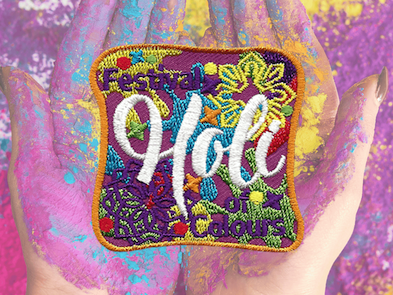 EPC's new Holi - Festival of Colours patch is displayed on a colour-burst background.