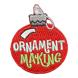 The words Ornament Making on a red ornament. 