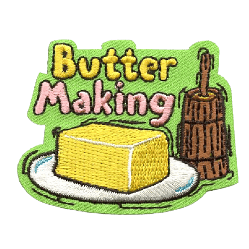 A block of butter beneath the words Butter Making. 